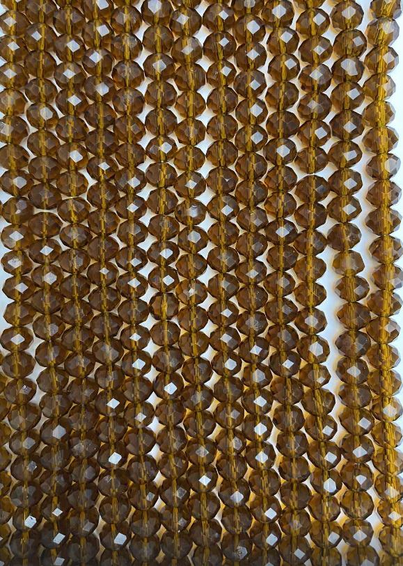 חרוזים מקריסטל צ'כי על חוט בצבע חום שקוף, חרוזי רונדל חתוכים בזוויות, קוטר 8×6 מ״מ, אורך כ-40 ס״מ +