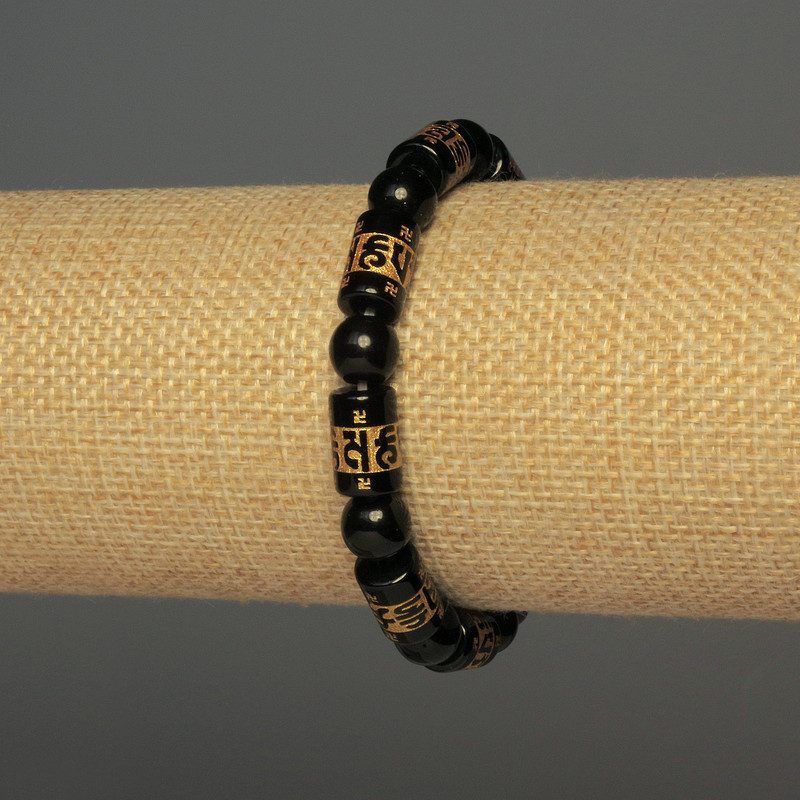 צמיד אגת מלאכותי — חרוז חלק בקוטר 8 מ"מ (+/-); תוספת צילינדרית בקוטר 12×8 מ"מ (+/-); אורך 18 ס"מ; אלסטי