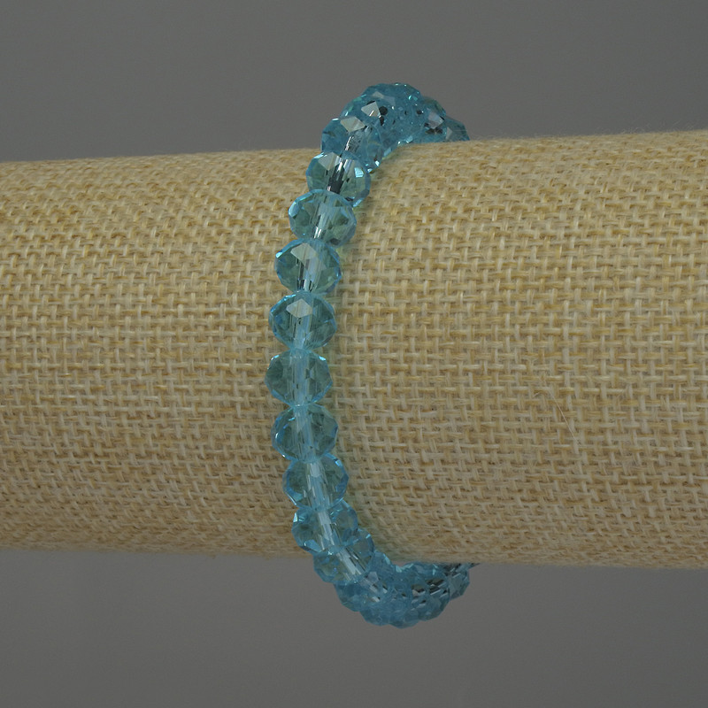 צמיד קריסטל צ'כי מובלט בצורת רונדל, קוטר 8×6 מ״מ, אורך כ-18 ס״מ, אלסטי