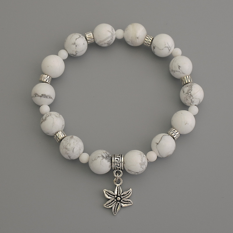 צמיד חרוזי קאולונג קוטר 10 מ״מ, חרוזי אגט קוטר 4 מ״מ, עם שיבוץ מתכת, אורך 18 ס״מ, אלסטי