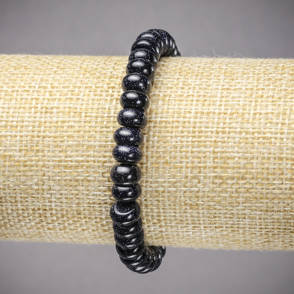 צמיד אלסטי מאבנטורין חול כחול «ליל קהיר» (דחוס) רונדל חלק, קוטר כ-8×5 מ״מ, אורך 18 ס״מ