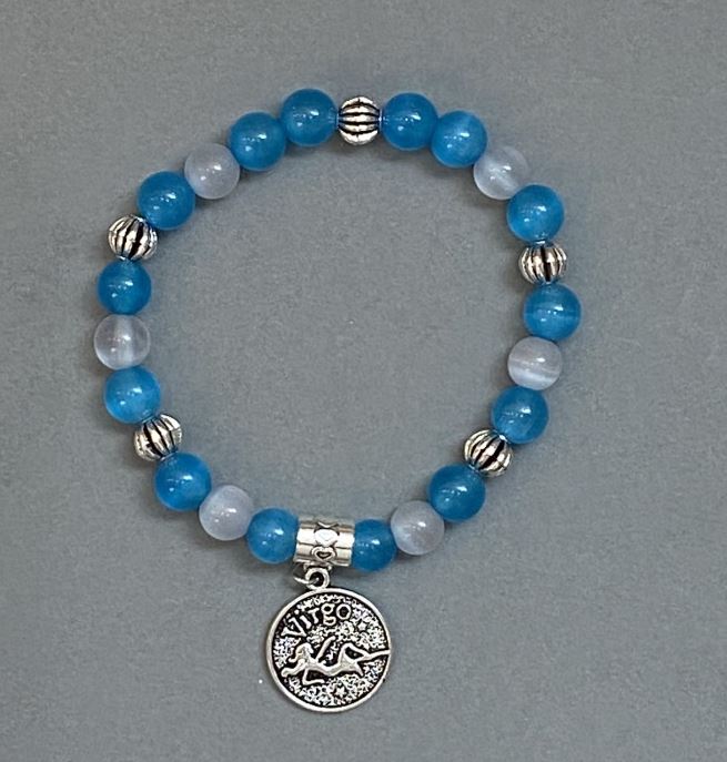 צמיד תערובת «עין החתול» חרוז חלק 8 מ״מ+- עם תוספות מתכתיות, אורך 18 מ״מ+- אלסטי