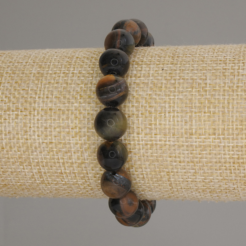 צמיד עם עין הבז – כדור חלק בקוטר 10 מ״מ, אורך כ-18 ס״מ, על בסיס אלסטי