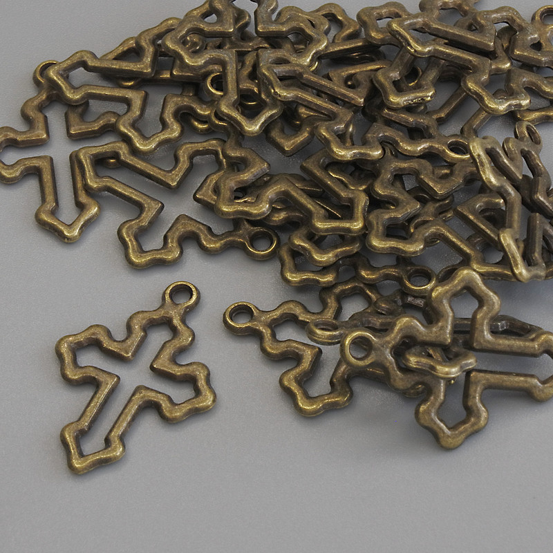 תליון צלב בצבע מתכת ברונזה, קוטר 21×15 מ״מ, ± אריזה 23 יחידות