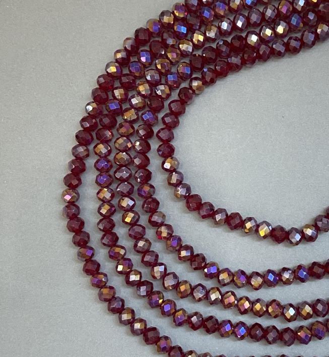 חרוזי קריסטל צ'כי על חוט דק אדומים שקופים עם ציפוי בנזין – רונדל מחורץ, קוטר 8×6 מ״מ, אורך כ-40 ס״מ