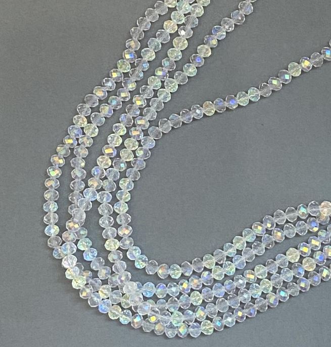 חרוזי קריסטל צ'כי על חוט לבן שקוף עם ציפוי בנזין, רונדל מחוספס-מולחם, קוטר 6x5 מ"מ, אורך 39 ס"מ +