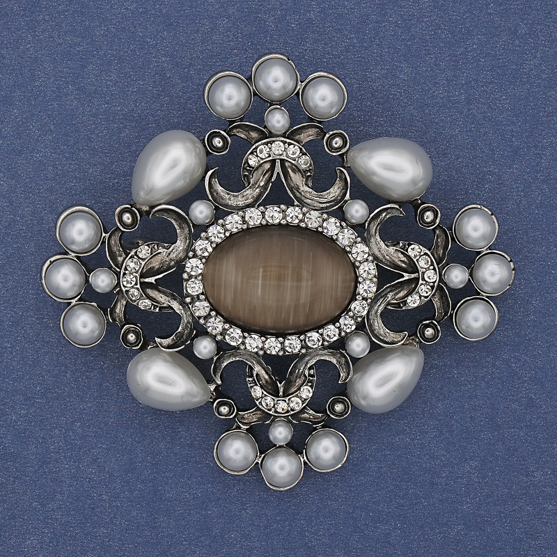 סיכה-תליון «הדגש פנינים עין חתול» כסוף