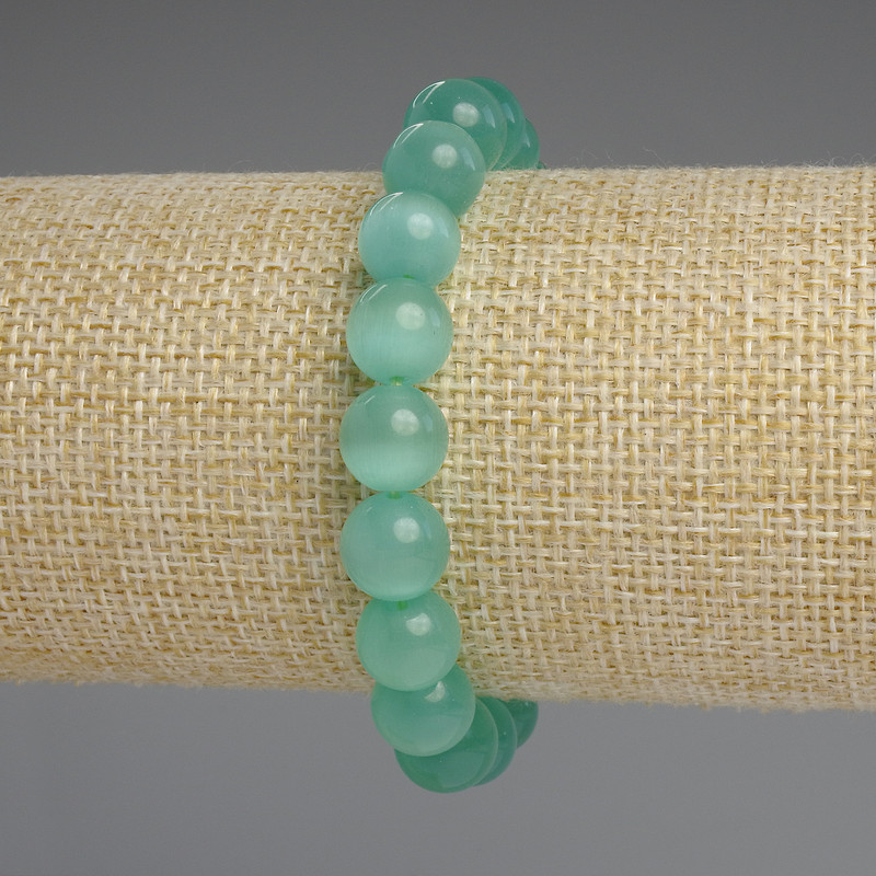 צמיד עין החתול – חרוזים חלקים בקוטר 10 מ״מ +/- אורך 18 ס״מ +/- סטרץ'