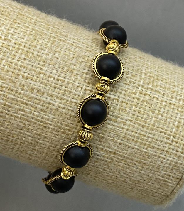 צמיד שונגייט עם כדורי חלק בקוטר 8 מ"מ ±, עם תוספות מתכת, אורך 18 ס"מ ±, גמיש