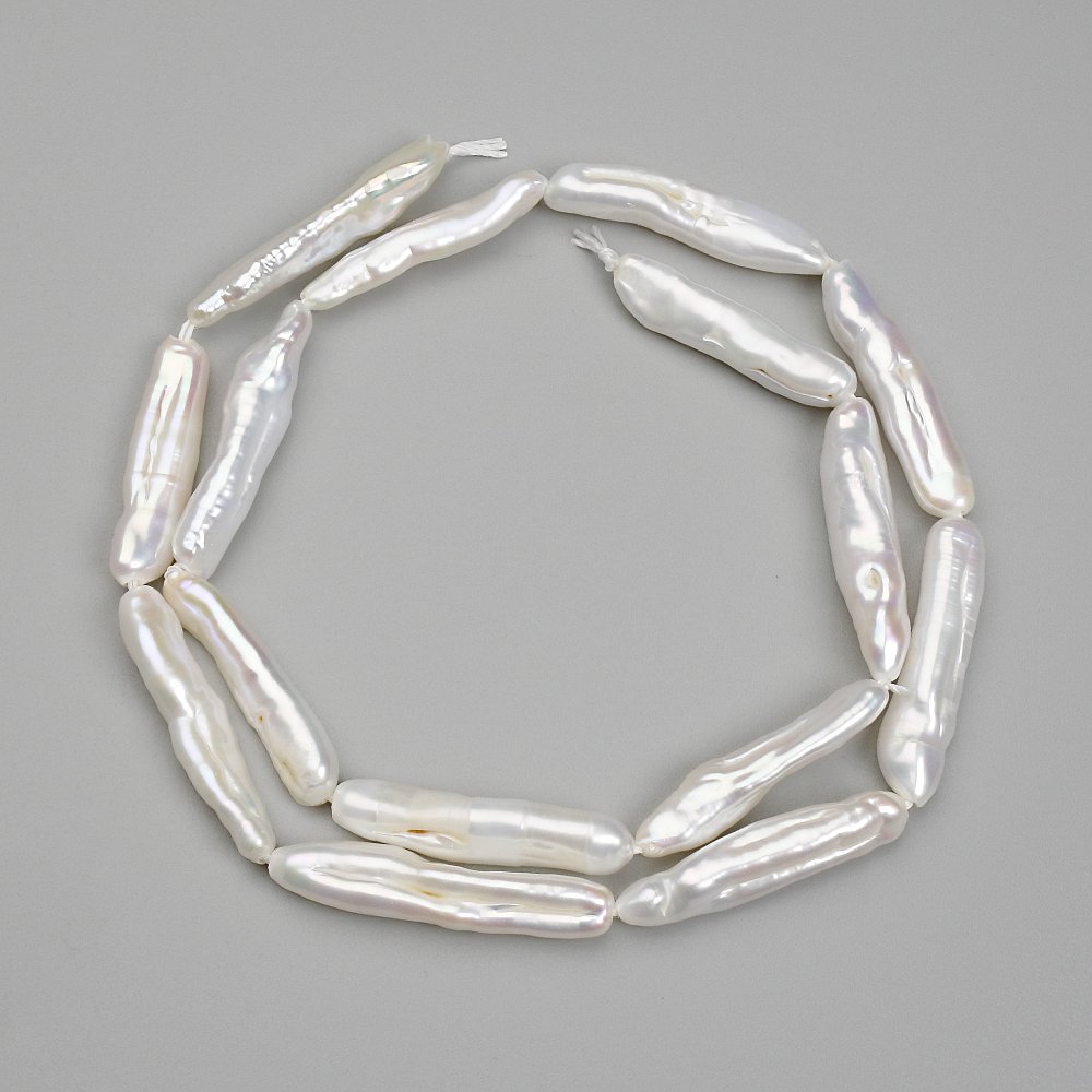 פניני בארוק בצבע «בנזין» 24-25×5-5, 5 מ״מ ±, אורך 39 ס״מ+