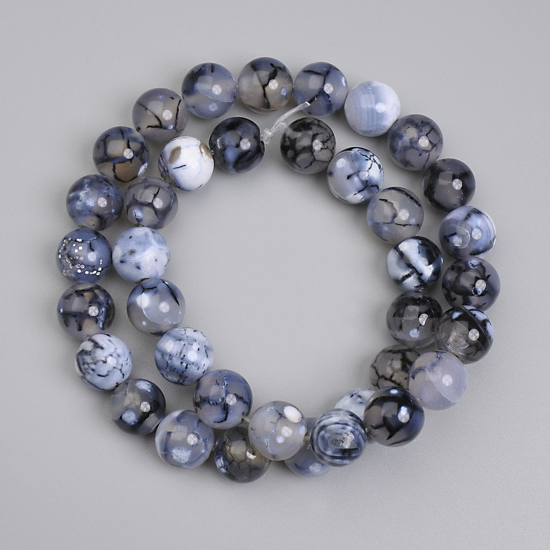 חרוזי אגת «ורידי הדרקון» חלקים בקוטר 10 מ״מ, אורך 37 ס״מ +- על חוט