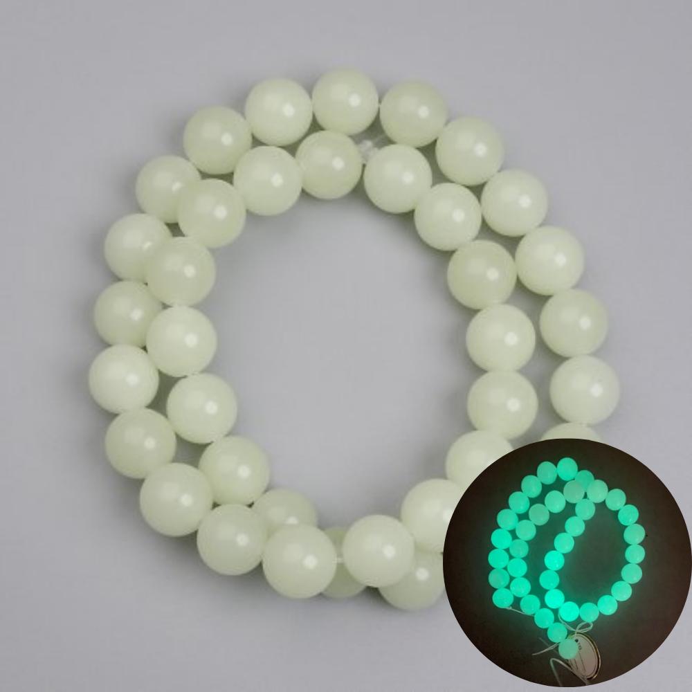 חרוזי אוניקס בזוהר ירוק – כדור חלק בקוטר 10 מ״מ ±, אורך 37 ס״מ על חוט