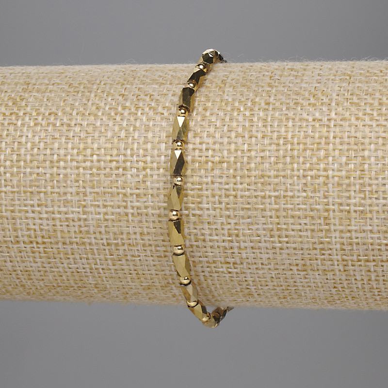 צמיד מקריסטל צ'כי זהוב, צילינדר חתוך 5×3 mm +- חרוז 2 mm +-, אורך 18 ס״מ, גמיש