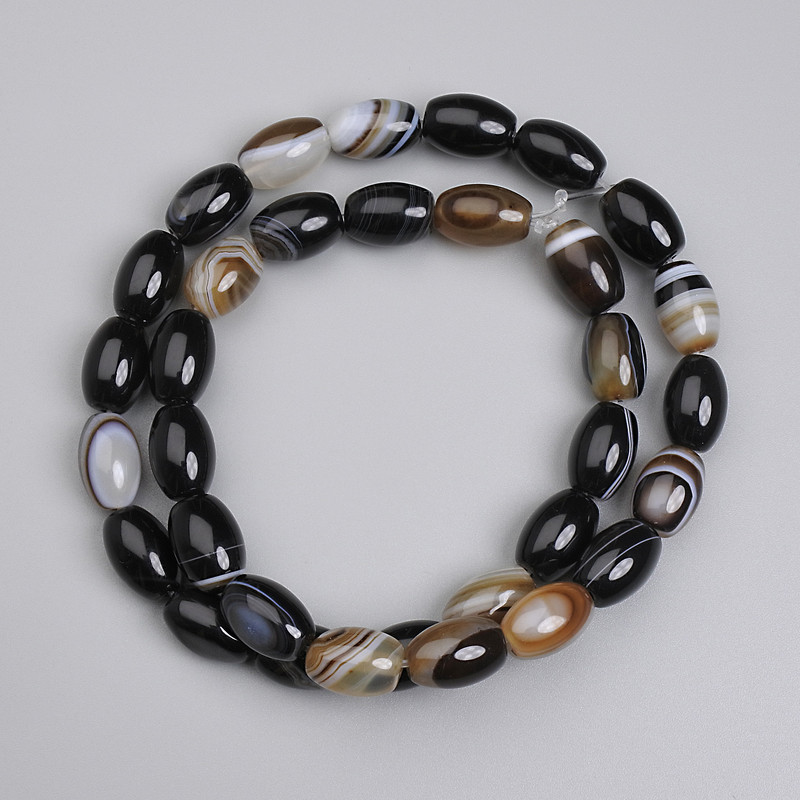 חרוזי אגת בצורת חבית, קוטר 12×8 מ״מ +- אורך 39 ס״מ +- על חוט