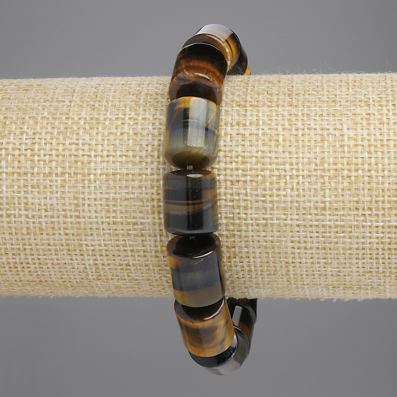 צמיד עין הנשר צילינדר, קוטר חרוזים 14×11 מ״מ, חרוזים 5 מ״מ ±, אורך 18 ס״מ ±, בסיס גמיש