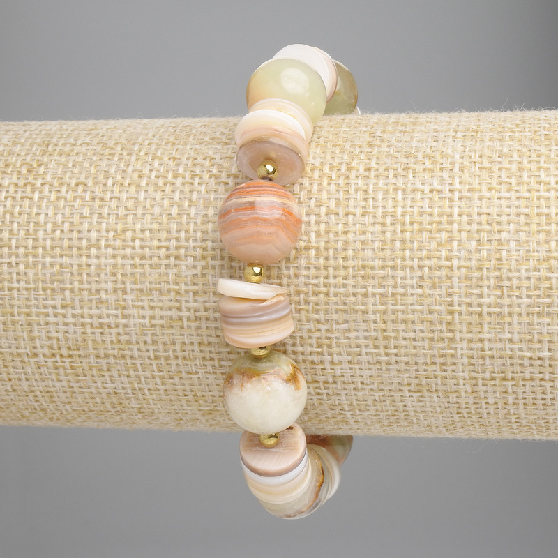 צמיד אוניקס חרוזים חלקים בקוטר 12 מ״מ ± סקפארקה-רונדל, קוטר 10×2 מ״מ ± המטיט 3 מ״מ ±, אורך 18 ס״מ ± אלסטי