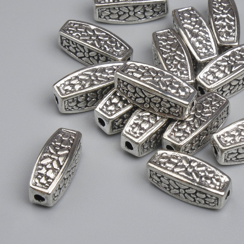 אביזרי חרוז-שיבוץ בצבע מתכת כסף, קוטר 12,5×5 מ״מ, פתח 2 מ״מ, אריזה ~14 יח'