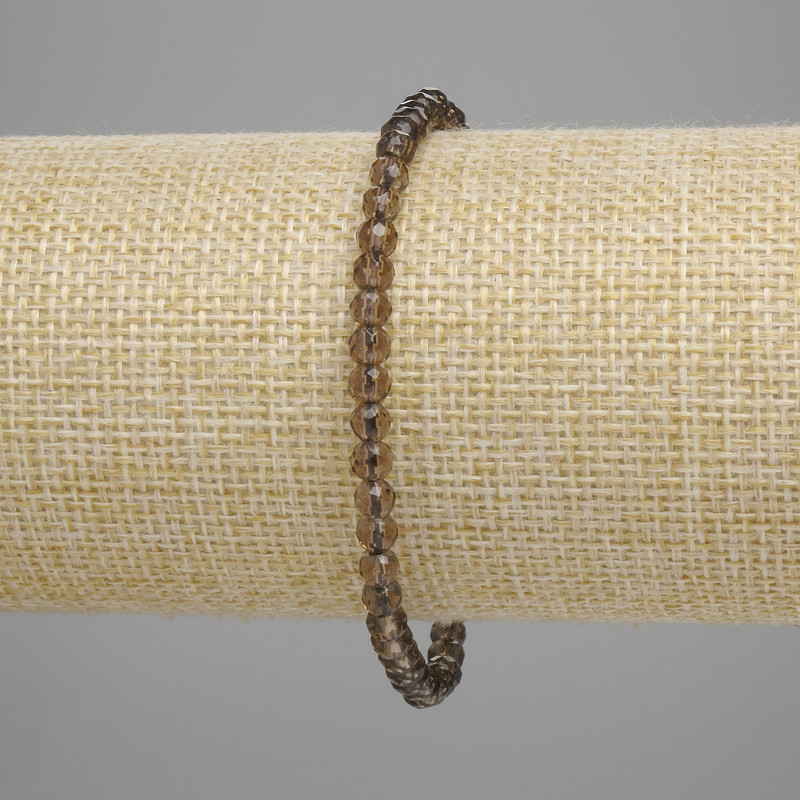 צמיד טופז מעושן מסותת בבקוטר 4 מ״מ, אורך 18 ס״מ, סטרץ׳