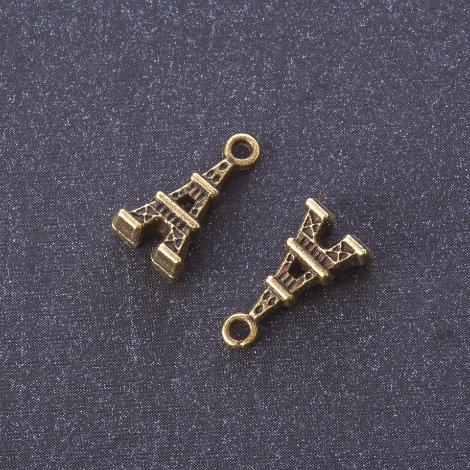 אביזרי תכשיטים תליון "מגדל אייפל" בצבע מתכת: ברונזה 1,6×0,8 ס״מ מסה 20 גרם, + -19 יחידות