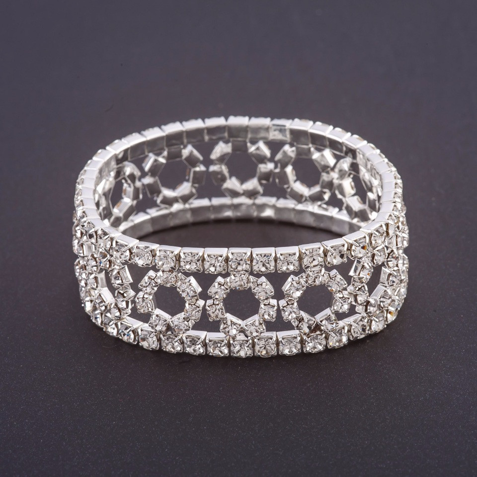 צמיד קריסטלים על בסיס אלסטי בדוגמת «טבעות» – אבני-זירקונים לבנות, רוחב 19 ס״מ, היקף 18.5 ס״מ, צבע המתכת «כסף»