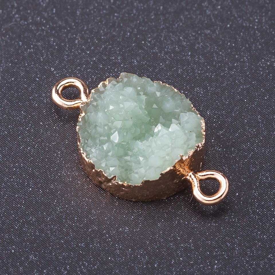 מחבר «שלג נפריטי» בצבע המתכת «זהב» אורך 1 מ״מ, קוטר 14 מ״מ פלסטיק