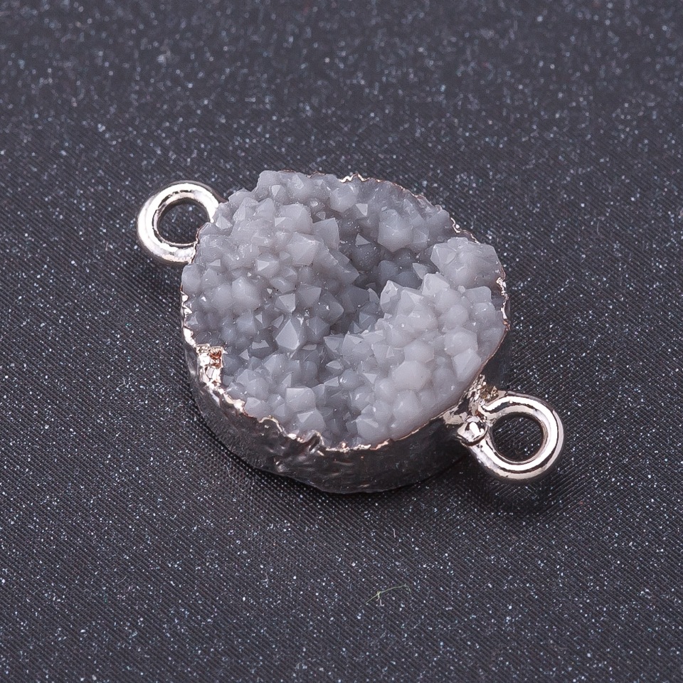 מחבר «שלג אפור» צבע המתכת: כסף אורך 1 מ״מ, קוטר 14 מ״מ, פלסטיק