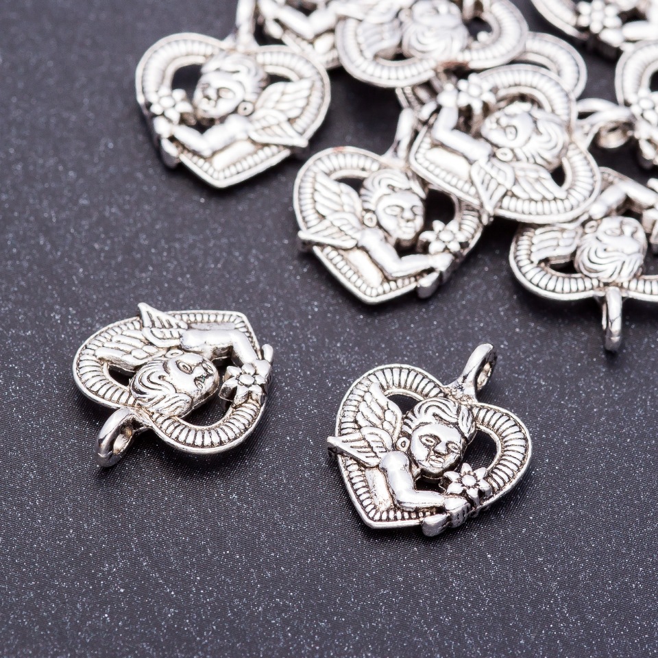 אביזרי תכשיטים - תליון קופידון בלב, קוטר 15 מ״מ, אורך 19 מ״מ, פתח 3 מ״מ, אריזה 20 גרם ±11 יחידות