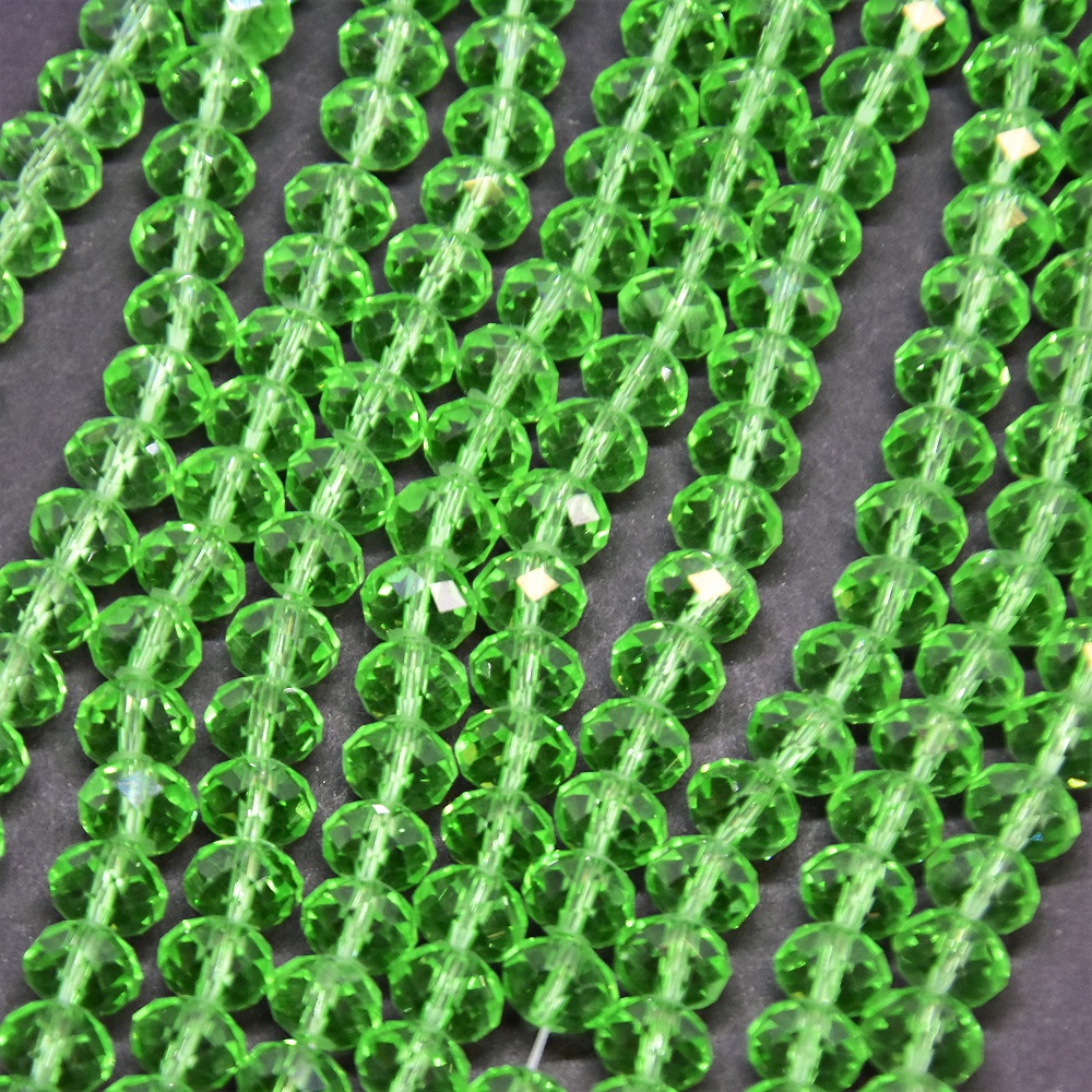 חרוזים מקריסטל צ'כי שקופים ירוקים בהירים אמרלד בצורת רונדל, בקוטר 8×6 מ״מ, אורך 40 ס״מ