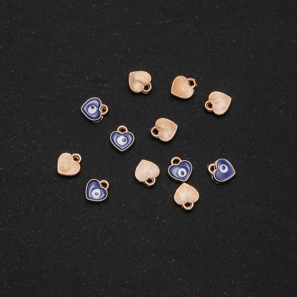 אביזרי תליה לב «עיניים» אמייל 7×8 מ״מ, אריזה 12 יח'