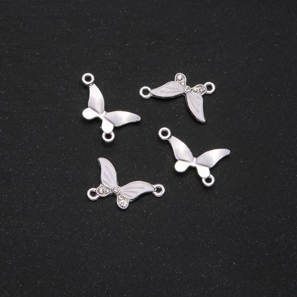 קונקטור פרפר אמייל לבן 24×12 מ״מ, אריזה 4 יחידות