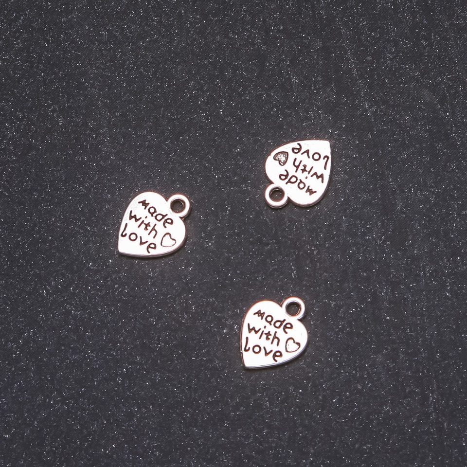 אביזרי תלייה לב 9×12 מ״מ – אריזה 20 גרם + -31 יחידות