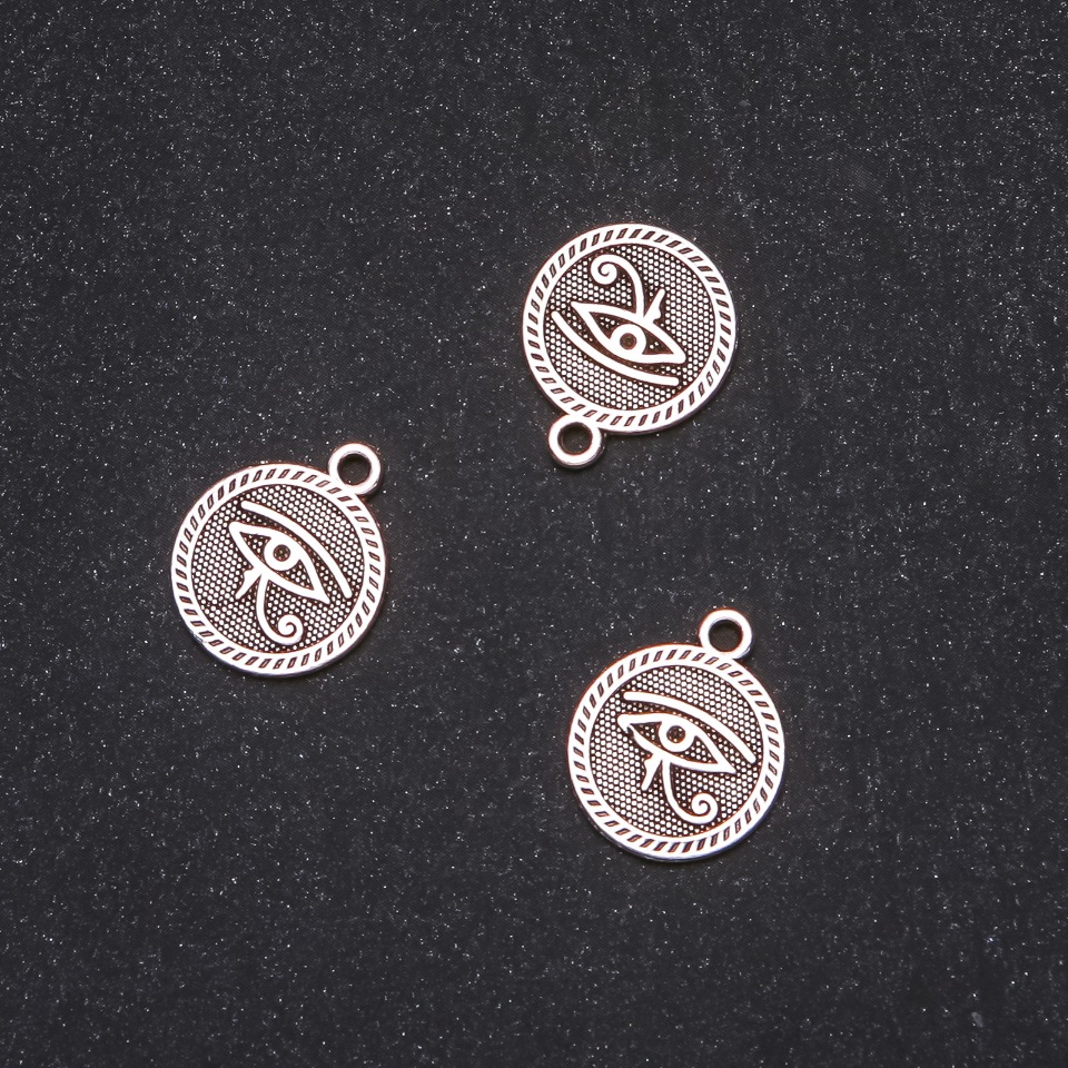 אביזרי תליון – העין המצרית 15×18 מ״מ, אריזה 20 גרם +/-12 יחידות