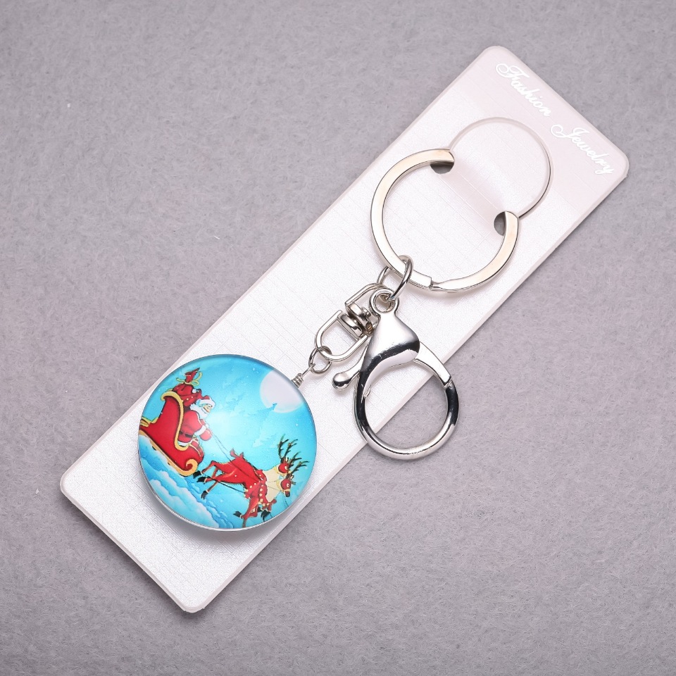 מחזיק מפתחות לשנה החדשה - סנטה קלאוס על איילים, אורך 10 ס״מ