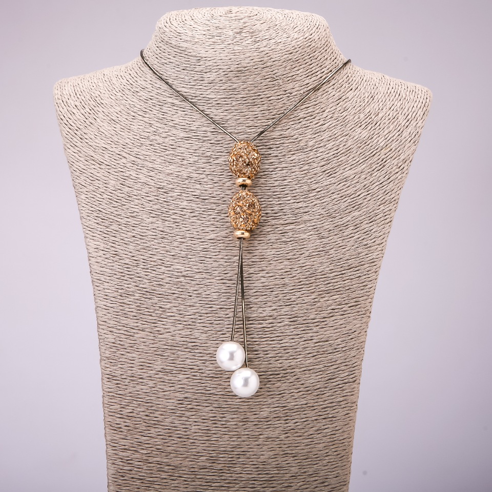 תליון-עניבה עם אבני זרקון צהובות על שרשרת ארוכה, מתכת בצבע «זהב שחור», קוטר 16×48 מ״מ, אורך 70 ס״מ