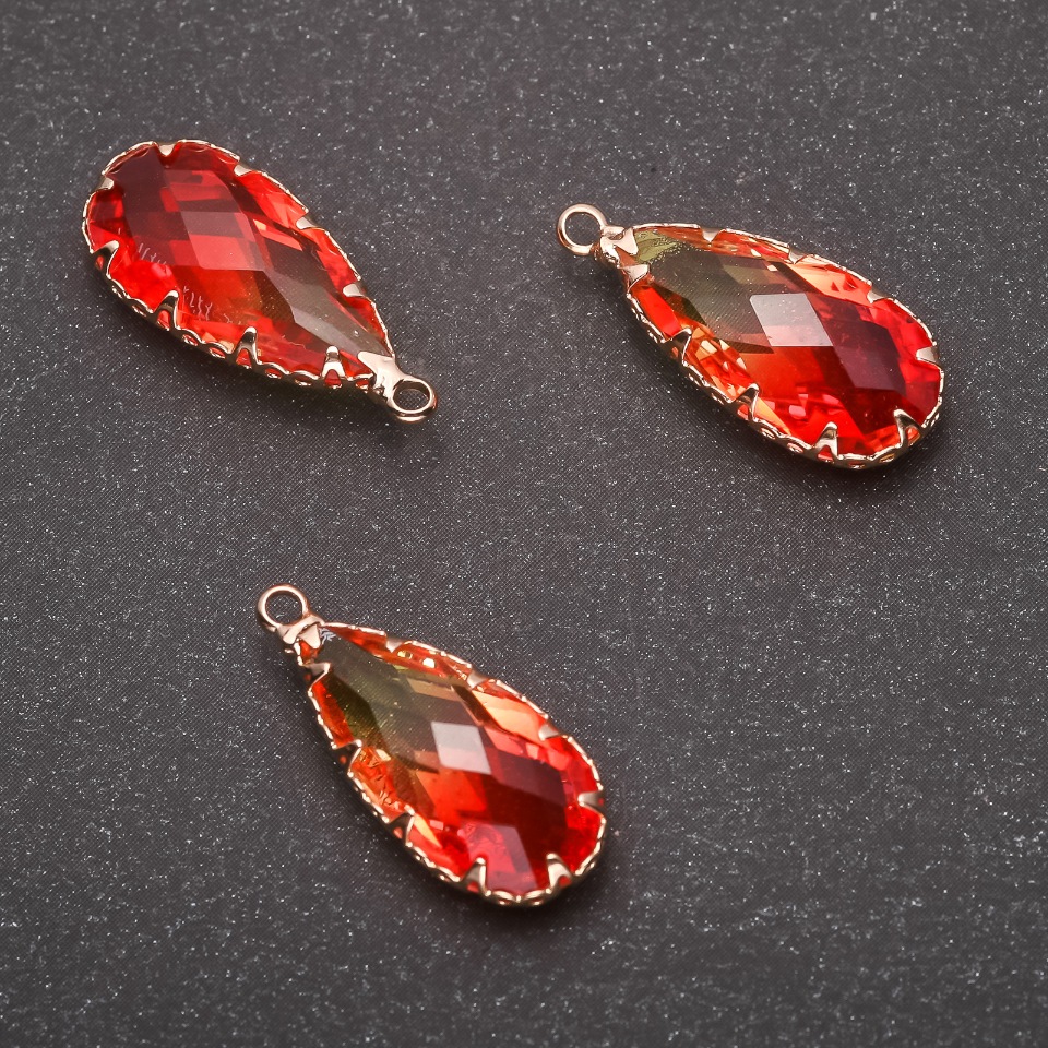 תליון «טיפה» בצבע צהוב-כתום, מסגרת זהובה 10×24 מ״מ