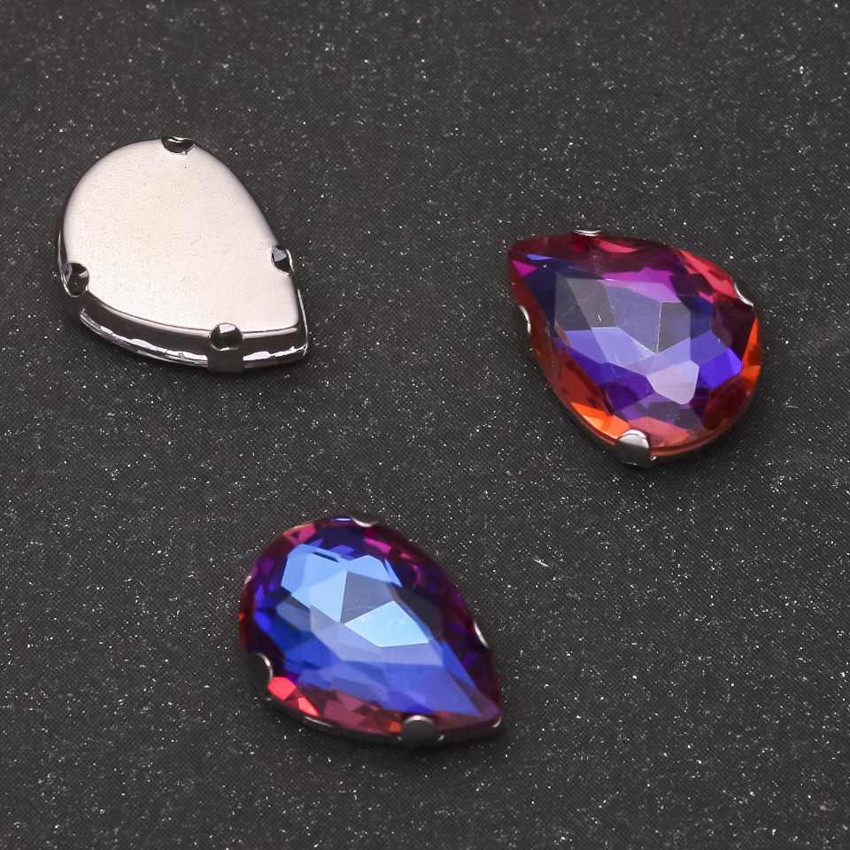 מחיר ליחידה /10 יח' קריסטל לתפירה בצבת בצורת טיפה 10×14 מ״מ כחול-סגול