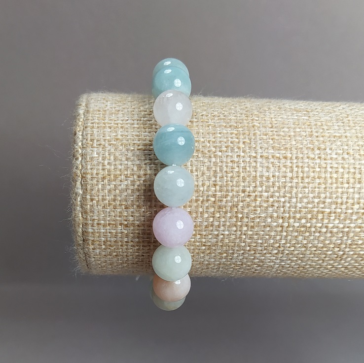 צמיד מאבן מורגניט טבעית – חרוזים חלקים, קוטר 10 מ״מ, היקף גמיש 18 ס״מ