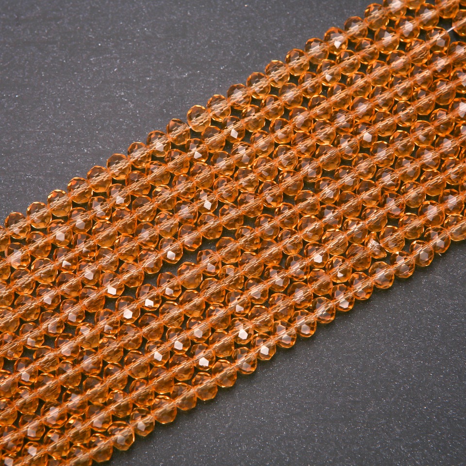 חרוזים קריסטל צ'כי שקוף בגוון ענבר "רונדל", קוטר 6×4, 5 (±) מ״מ, חוט, אורך 38 ס״מ