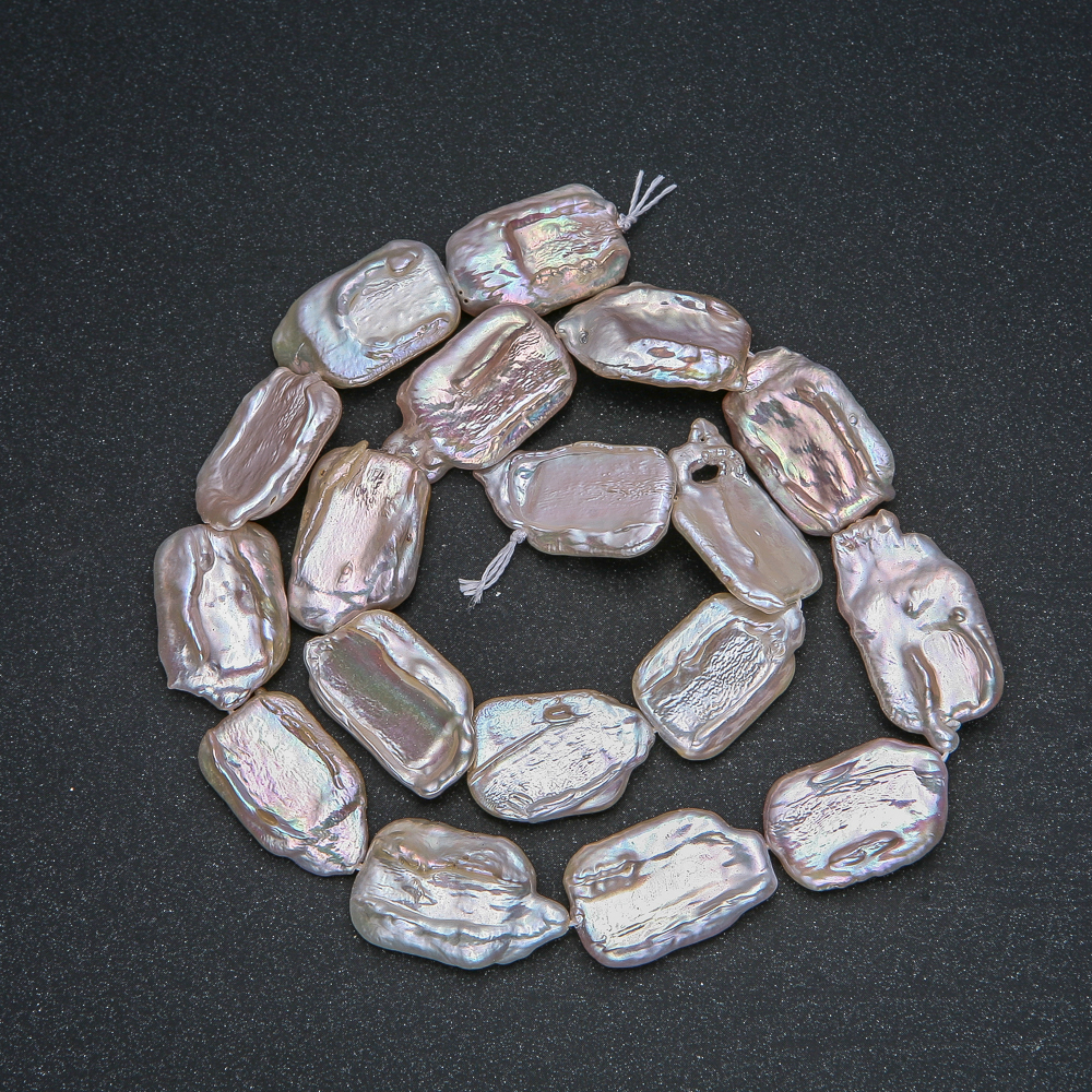 חוט פניני בארוק טבעיות, קוטר 22×14 מ״מ, אורך 40 ס״מ ± עם גוון בנזיני