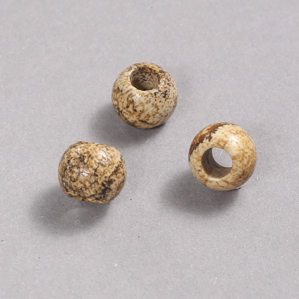 חרוז פנדורה מאבן יאשמה נופית 12×10 מ״מ, קוטר החור 5 מ״מ +