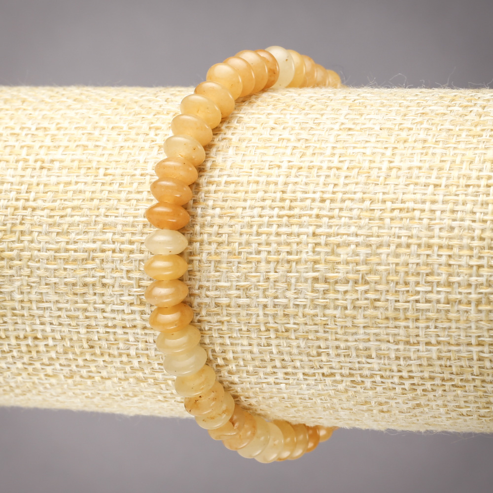 צמיד אגט צהוב חלק על גומי, קוטר 6×3 מ״מ