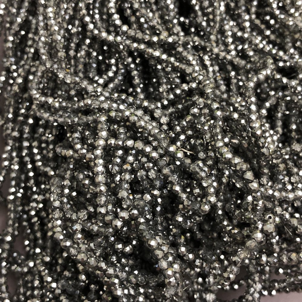 חרוזי קריסטל צ'כי על חוט בצבע אפור שקוף, רונדל מפוסל בקוטר 3×2.5 מ״מ, אורך 36 ס״מ + -