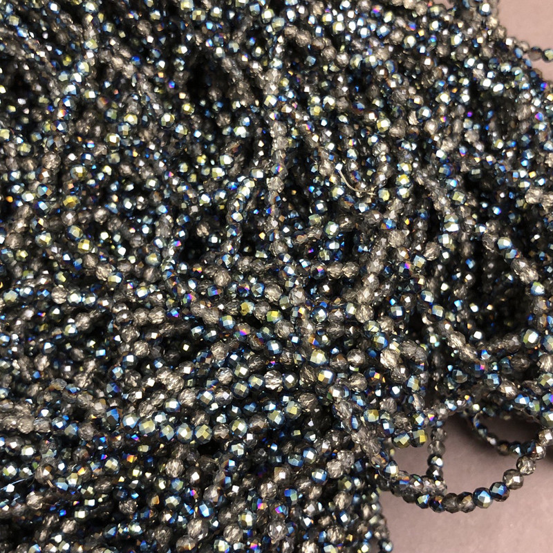 חרוזי קריסטל צ'כי על חוט, תערובת אפורה-שקופה עם ציפוי, רונדלים מחורצים, קוטר 3×2.5 מ״מ + -, אורך 36 ס״מ +