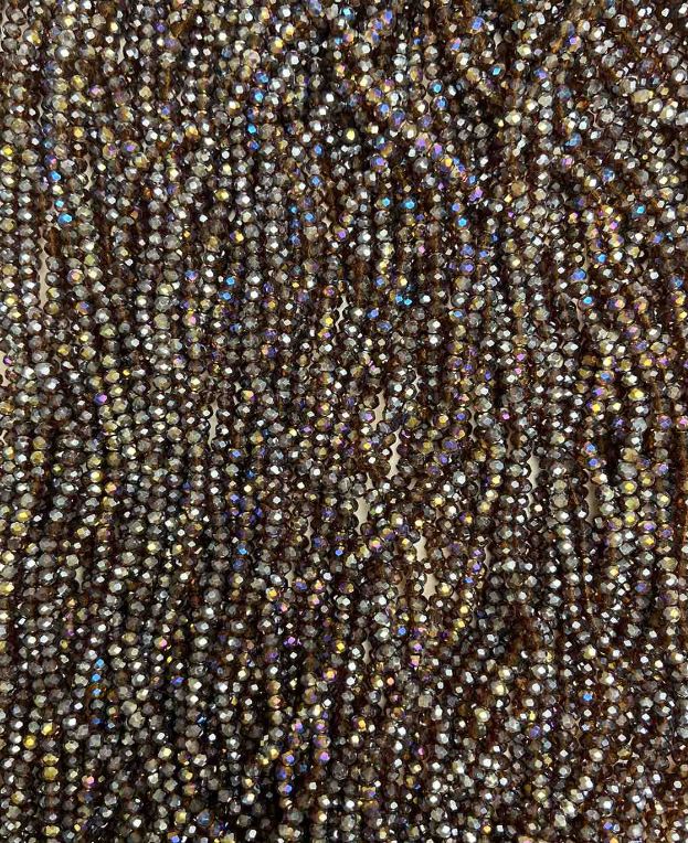 חרוזי קריסטל צ'כי על חוט חומים כהה עם ציפוי בנזין, ראונדלים מגולפים, קוטר כ-3,5×3 מ"מ, אורך כ-32 ס"מ, +