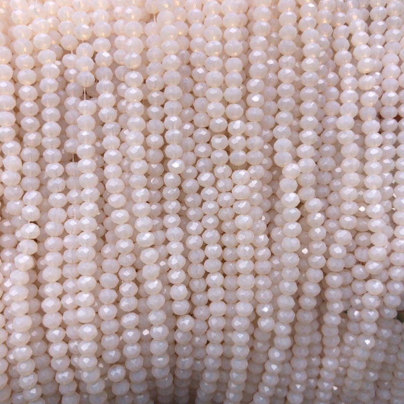 חרוזי קריסטל צ'כי על חוט בצבע אפרסק מאט, מחורצים, בצורת רונדל, קוטר 3×2.5 מ״מ, אורך 36–38 ס״מ + -