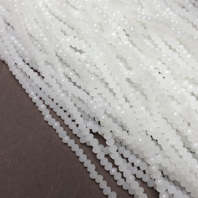 חרוזים חלביים מט מקריסטל צ'כיה על חוט – רונדל מחורץ, קוטר 3×2.5 מ״מ, אורך 36-38 ס״מ +