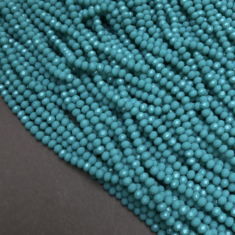 חרוזים מט טורקיז מקריסטל צ'כי על חוט דק, רונדל מזוגזג, קוטר 3,5×3 מ״מ, אורך 36–38 ס״מ +