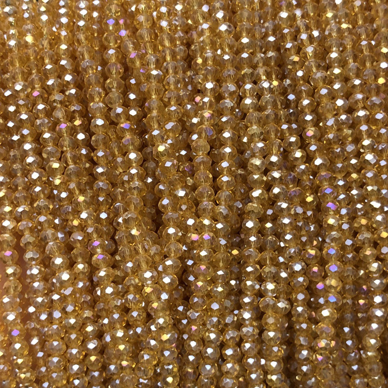 חרוזי קריסטל צ'כי על חוט שקוף בצבע כתום-אפרסק שקוף עם זוהר בנזיני, רונדל מחורץ, קוטר 3,5×3 מ"מ, + -, אורך 36-38 ס"מ