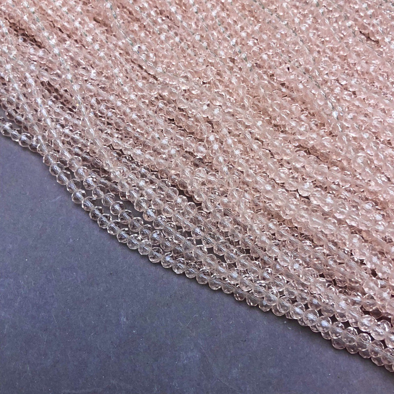 חרוזי קריסטל צ'כיה על חוט בהיר-ורוד שקוף רונדל מחורץ, קוטר 3,5×3 מ״מ + -, אורך 36–38 ס״מ +