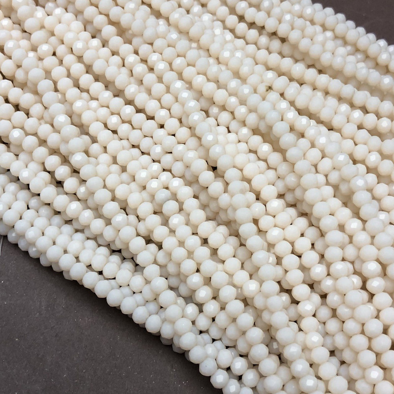 חרוזי קריסטל צ'כי על חוט דק בגוון אפרסק מט, רונדל מפוסל, קוטר 3,5×3 מ״מ, אורך 36-38 ס״מ + -